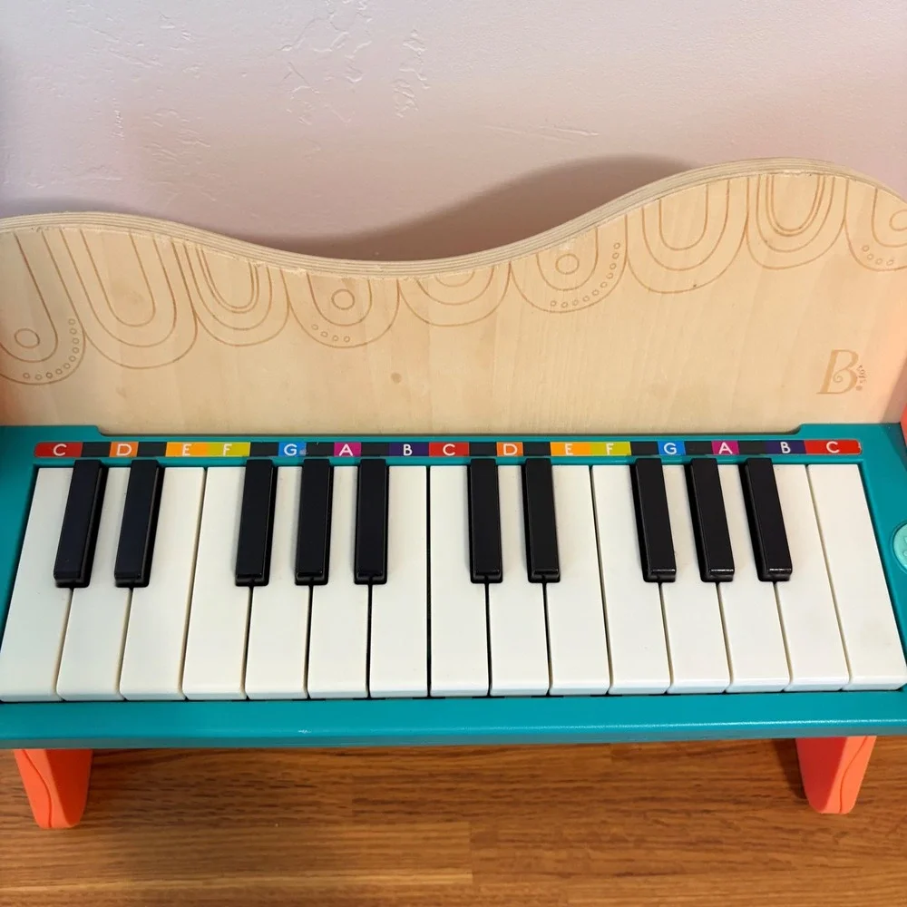 B. toys Wooden Toy Piano 25-Key Electronic Color-coded Kids Classical Music